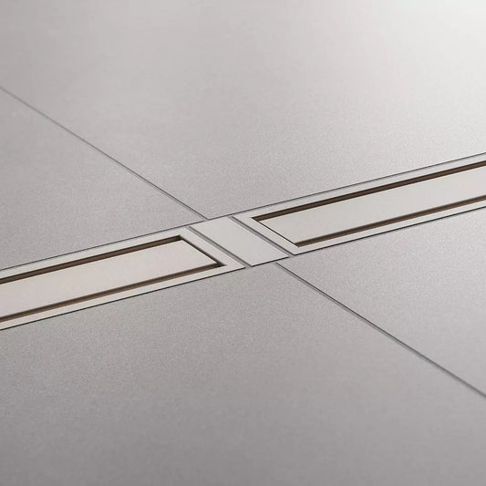 Schlüter-KERDI-LINE-FC - Edelstahlelement zur optischen Verbindung der Rost-/Rahmen-Einheiten bei der Reiheninstallation mehrerer Schlüter-KERDI-LINE