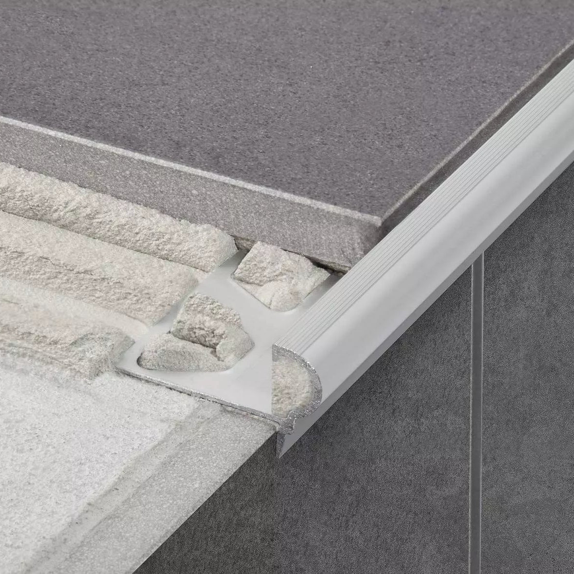 Schlüter-TREP-FL Profile - Florentinerformiges Treppenprofil aus Aluminium oder Edelstahl